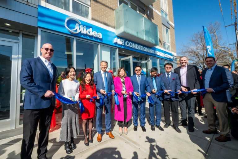 Midea held a ribbon-cutting ceremony for the opening of its first U.S. showroom and distribution center in Queens. Pictured left to right: David Rames, Midea; Shannon Liu, Midea; Dr. Wenqing Zhang, Ai-Midea; Phil Huang, Midea; U.S. Congresswoman Grace Meng; Kenny Liu, Ai-Midea; Denis Liu, Midea; Victor Xu, Ai-Midea; Chris Corcoran, assistant director, New York State Energy and Resource Development Authority; Eric Hervol, Midea. (Diane Bondareff/AP Images for Midea)